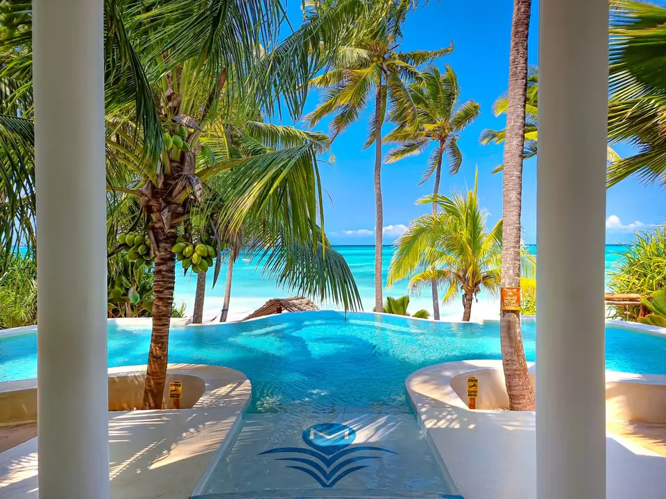 Villa Kidosho | pool view from the shared lounge to the pool and ocean