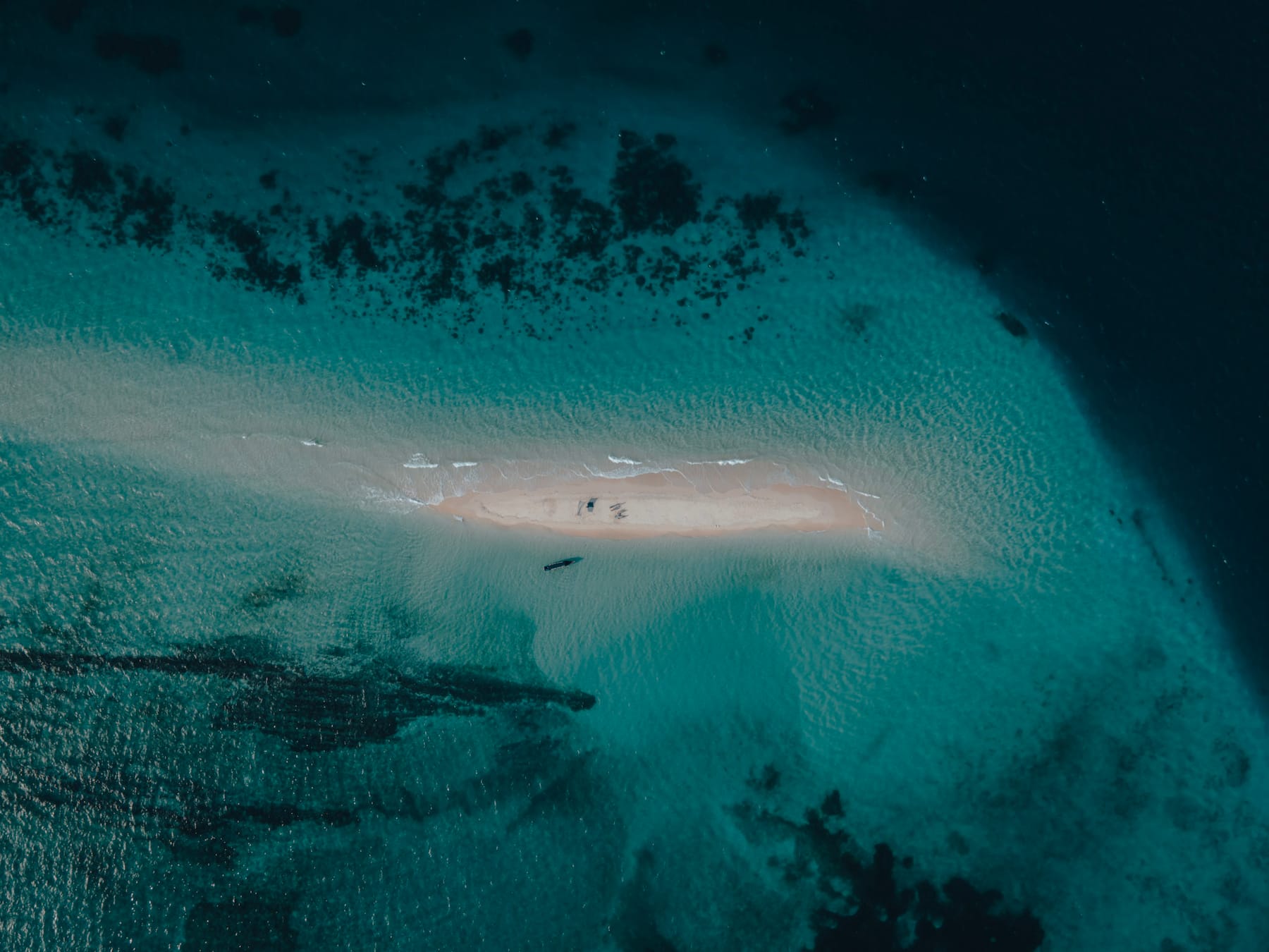 The sandbank and the channel at low tide, seen from the air